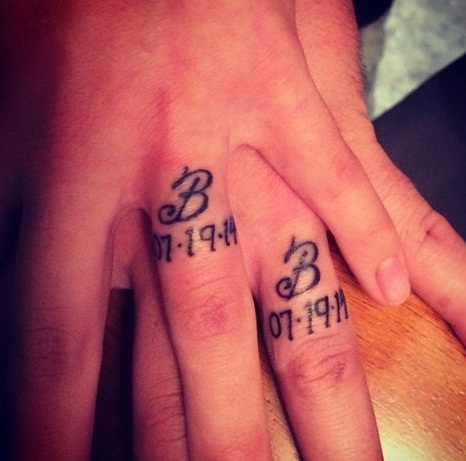 Impressive Wedding Ring Finger Tattoos Design