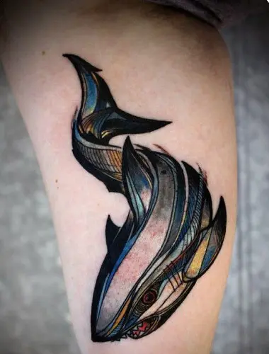 Single needle shark tattoo on the forearm