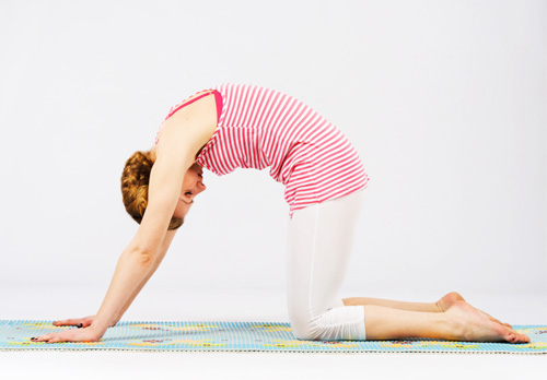 Cat Pose yoga for neck and shoulder pain relief