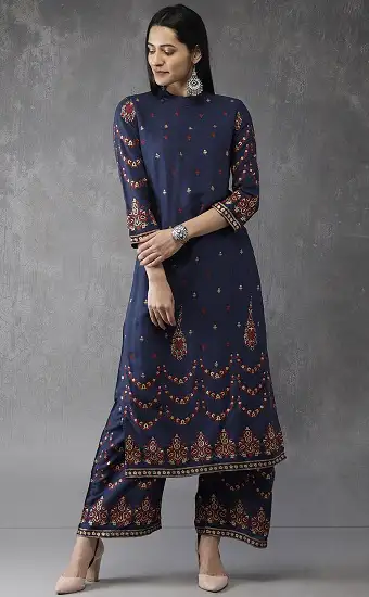 Dark blue kurti with embroidery and prints and printed pink skirt  Kurti  Fashion