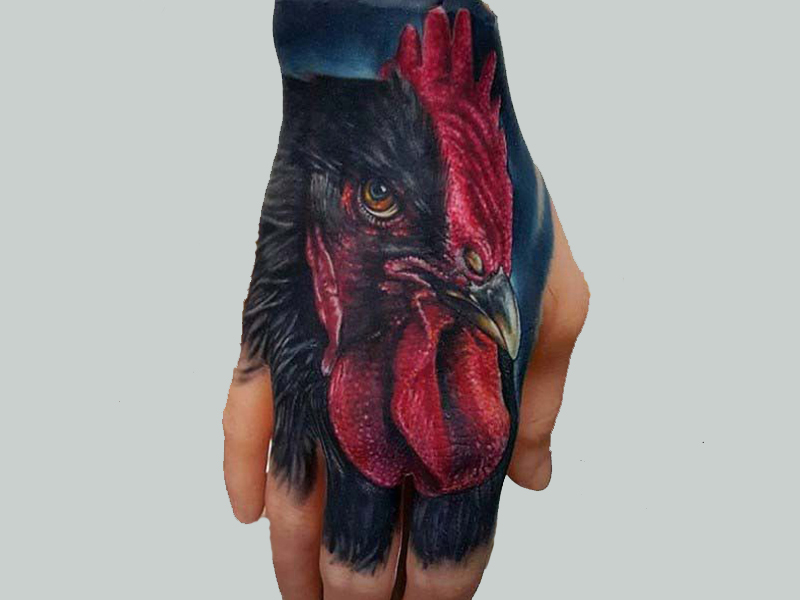 tribal fighting rooster tattoo