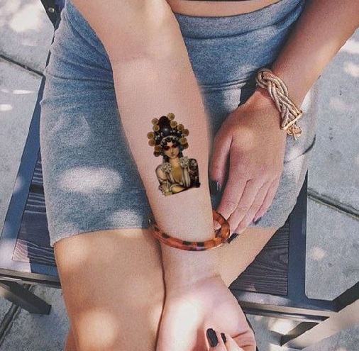 Woman with Small Aztec Tattoo
