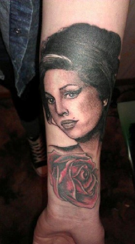 Amy Winehouse with a Rose Tattoo