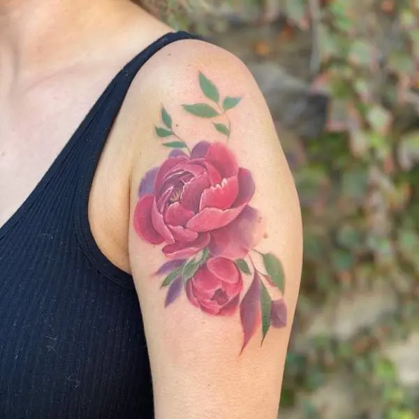 Red Peony tattoo on the forearm