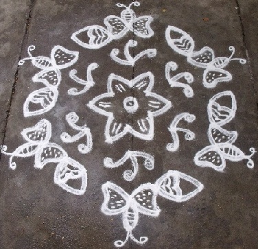 Butterfly Rangoli with 11 Dots