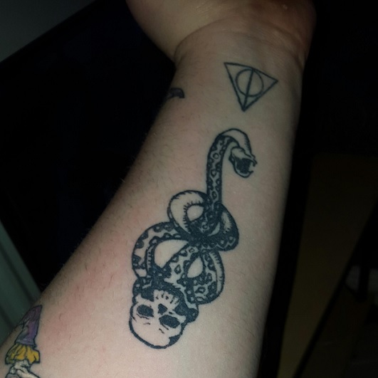 The Nagini with Deathly Hallow Tattoo