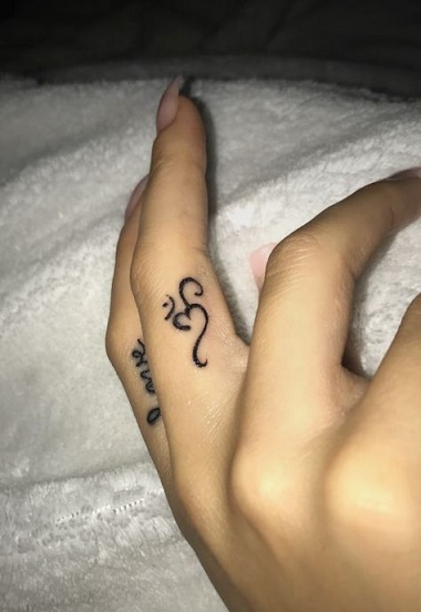 Om Tattoo Design on Fingers
