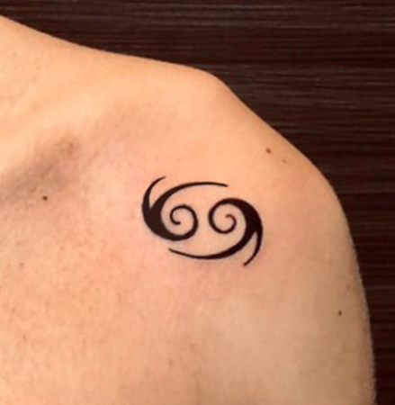 Bold Cancer Sign Tattoo On The Shoulder