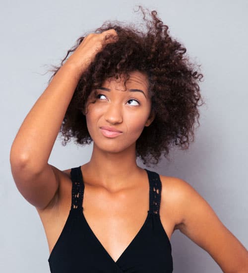 5 Side Swept Hairstyles Every Curly Girl Loves  NaturallyCurlycom