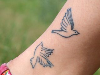 20 Most Beautiful Dove Tattoo Designs and Their Meanings