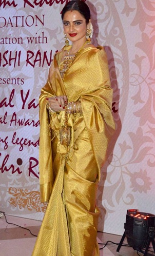 Get Traditional Look In Golden Party Wear Navratna Silk Saree