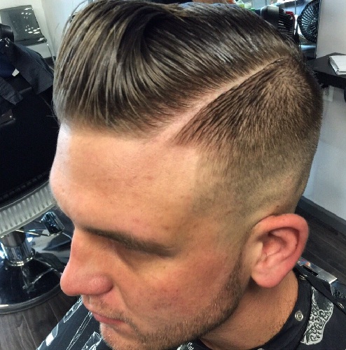 Low Bald Fade with Hard Part and Comb Over