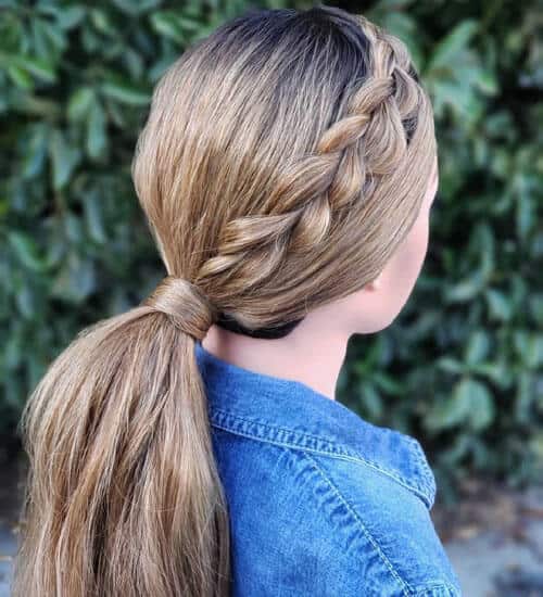 low sleek braided ponytail