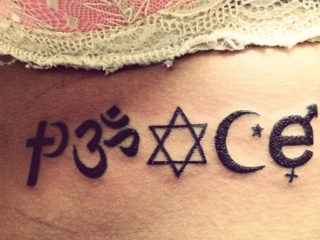 15 Best Peace Tattoo Designs To Enhance Your Beauty!