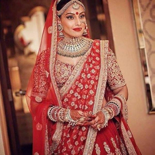 Bride in a red saree | Red saree wedding, Indian bridal sarees, Indian  bridal dress