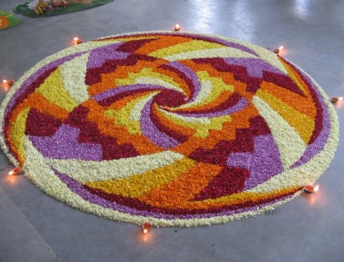 Different Petals Of Flowers And Diyas Rangoli