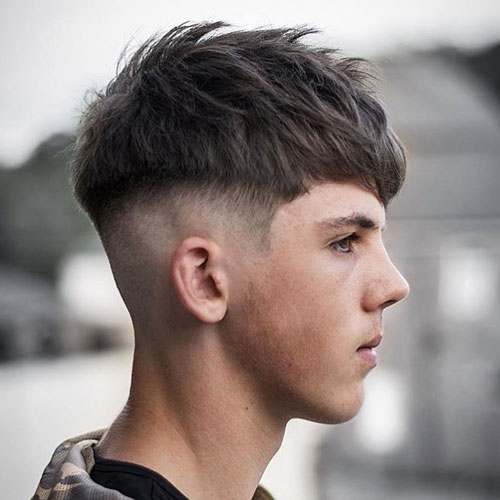 Mushroom Haircut That Has Sides Shaved And Also Has A Close Cut 