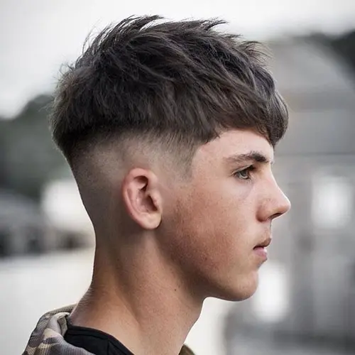 Mushroom Haircut That Has Sides Shaved And Also Has A Close Cut .webp