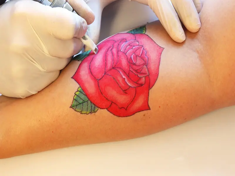 1. Sensual rose tattoo designs - wide 6