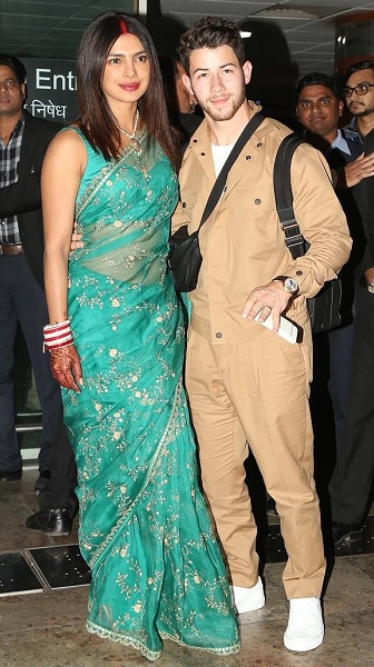 Priyanka Chopra In Green Saree With Nick Jonas