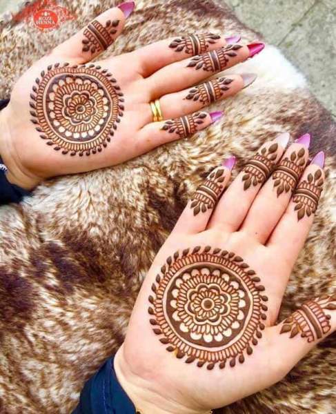 Mehndi design on Indian bride's palm on her wedding eve. Photograph by  Gowtum Bachoo - Fine Art America