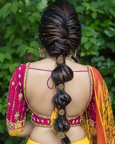 Lehenga hairstyle braid for bride