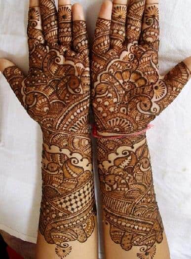 Rich Floral and Peacock Mehndi Designs