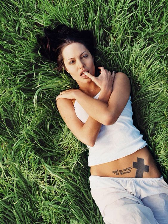 Angelina Jolie Cross Tattoo On Hip