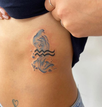 Alluring Tattoo Aquarius Symbol