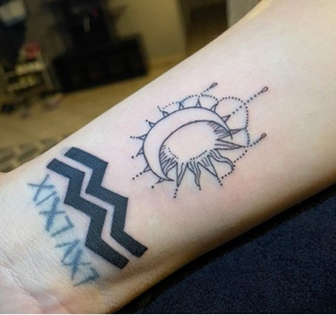 Bold Aquarius Symbol Tattoo