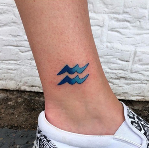 Cool Aquarius Tattoo Near The Ankle
