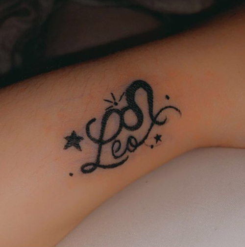 Cursive Leo Letters With Stars On The Arm
