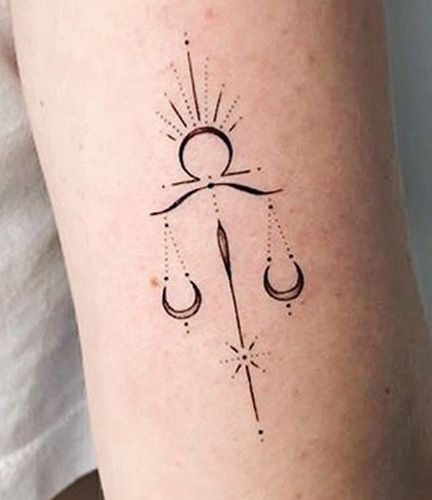 Cute Libra Zodiac Tattoo Near The Elbow