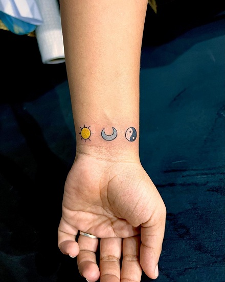 Small Yin Yang Tattoo With Sun And Moon