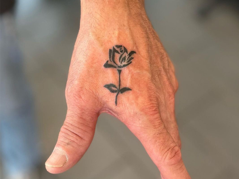 Top 9 Charming Tribal Rose Tattoo Designs