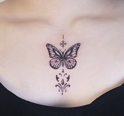 Black Butterfly Tattoo On The Chest