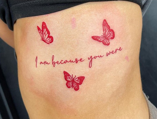 Bright Pink Butterfly Tattoo