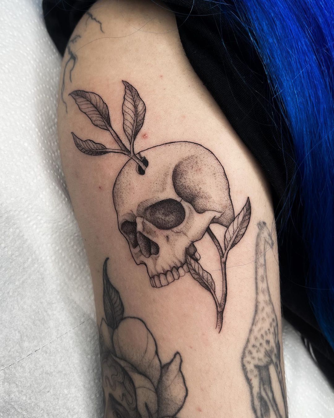Botanical Rebirth Skull Tattoo