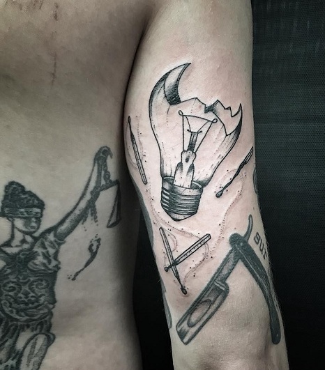 Meaningful Upper Arm Tattoos For Men