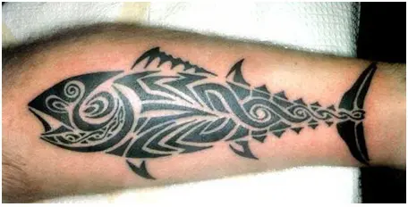 Minimalistic fish tattoo done on the finger