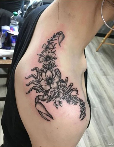 Beautiful Scorpio Flower Tattoo For Females On The Neck