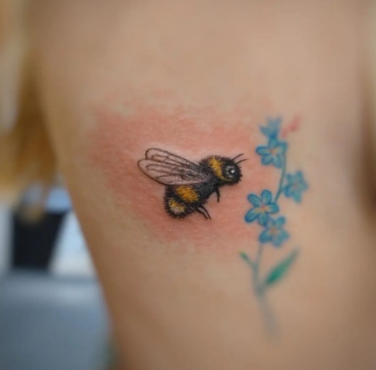 Miss Stitch - Reworked this old faded bee from behind the ear the other  day. Now it's very clearly a beautiful bee again. . If your interested in  getting a tattoo with