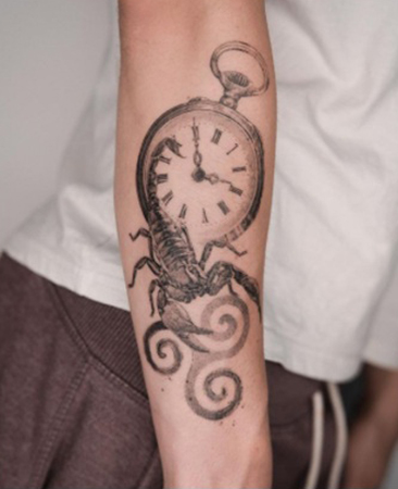 Scorpio Tattoo On Hand With A Stopwatch