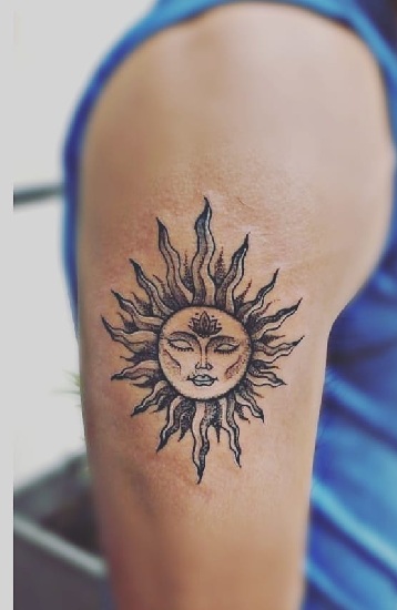 Tribal Sun Tattoo With Face