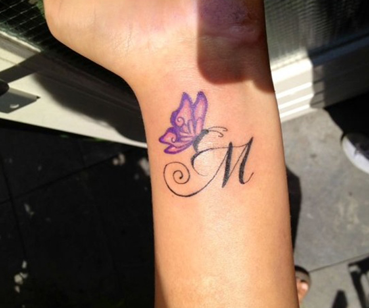 Affectionate M Letter Tattoo With A Butterfly