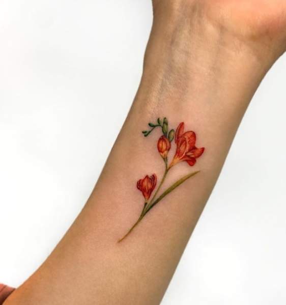 Charming Freesia Tattoo Design On The Wrist