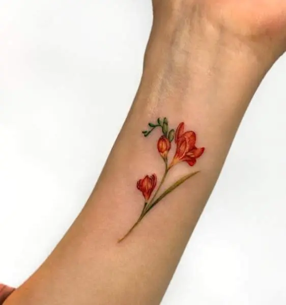 Mari Ink Tattoos  Matching freesia flower tattoos  Facebook