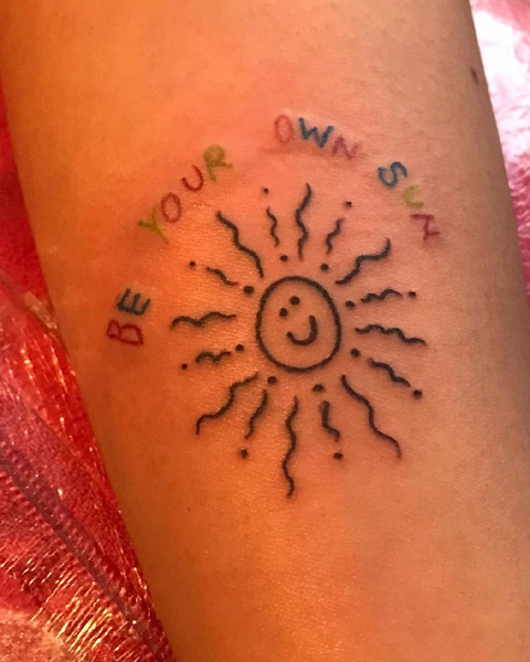 Childish Sun Tattoo Design