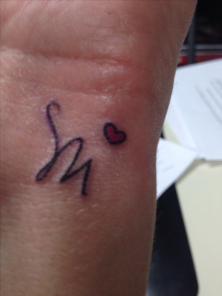 Cursive M Letter Love Tattoo