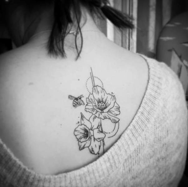 Daffodil Tattoo On The Back With A Bee